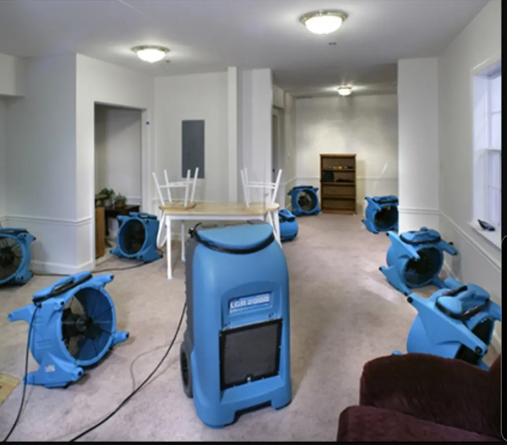 Air movers and dehumidifier setup for Water Damage Restoration in Woodlake